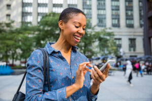 Woman texting in the streets in Chicago